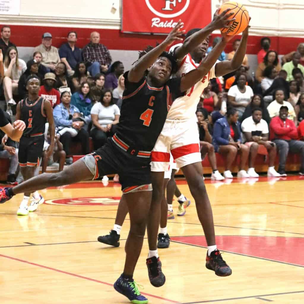 Santa Fe's Antonio Hall battles for a rebound in the Region 2-4A semifinals against Cocoa on Tuesday.