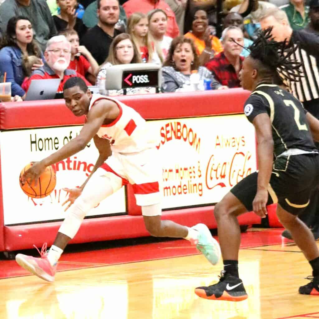 Santa Fe's Braylon Guyden with a first quarter steal against The Villages in the Region 2-4A Final on Friday.