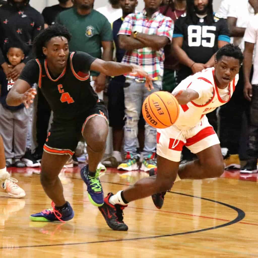 Santa Fe's Jamil Watson Jr. steals the ball in the first quarter in the Region 2-4A semifinals against Cocoa on Tuesday.