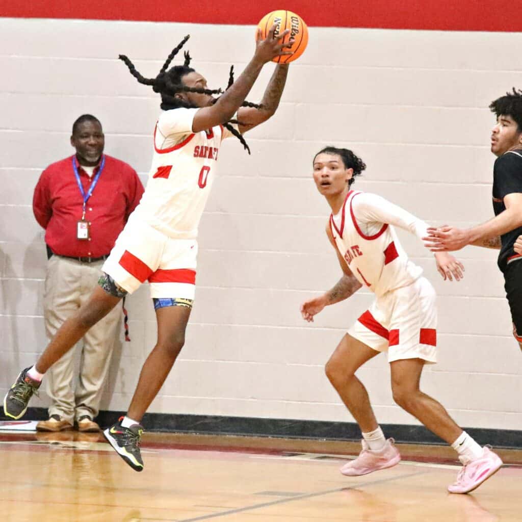 Santa Fe's M.J. Green goes for a second half rebound in the Region 2-4A semifinals against Cocoa on Tuesday.