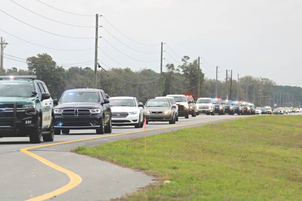 The long line of area law enforcement vehicles coming down State Road 26 on Friday for Alachua County Sheriff's deputy Nikolas Tilliman's procession.