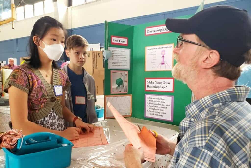 Lincoln Middle School sixth graders present a bacteriophage display on Wednesday.