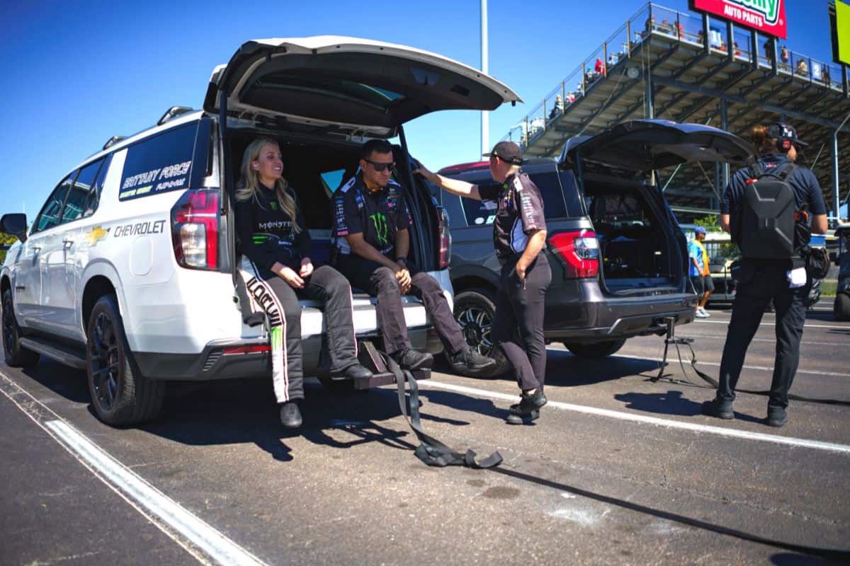 Racer Brittany Force (left) in preparation for eliminations at Gatornationals