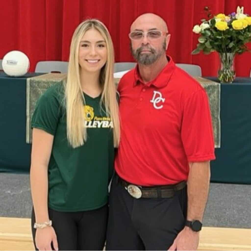 Anna Ellison (left) and Dixie County volleyball coach James Bendel Jr.