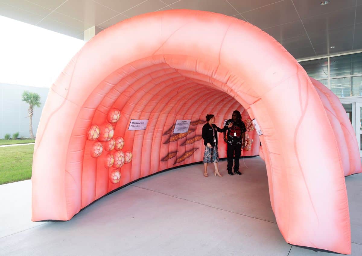 The North FloridaSouth Georgia Veterans Health System erected its inflatable Rollin' Colon outside the building as an educational tool to coincide with the dedication event on Friday.