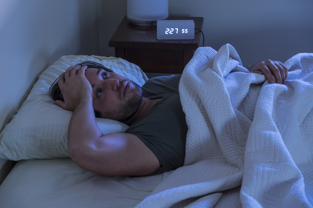 Man unable to fall asleep in bed sleep apnea