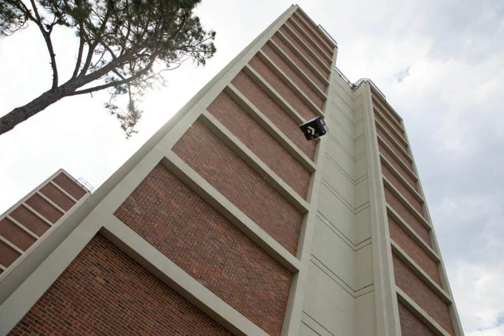 An egg transport crafted from a shoebox falls 160 feet from the roof of Beaty Towers East.