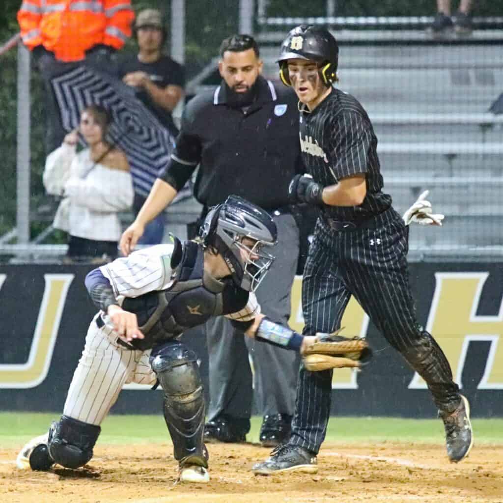 Buchholz's Cooper Collins scored the Bobcats' second run in the bottom of the first inning against Gulf Breeze on Wednesday.