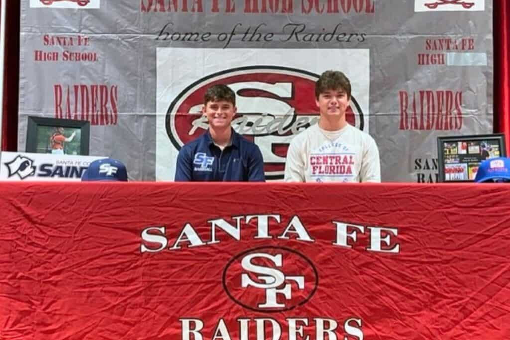 Santa Fe High School baseball players Kyler Nowling (left) and Dawson Card held a college signing event on Wednesday.