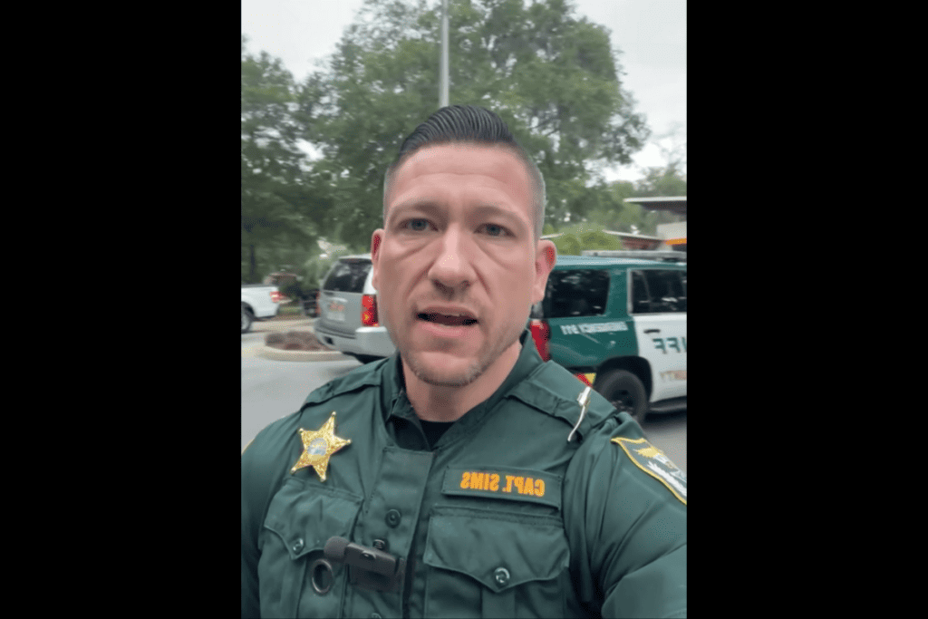 Captain Chris Sims speaking