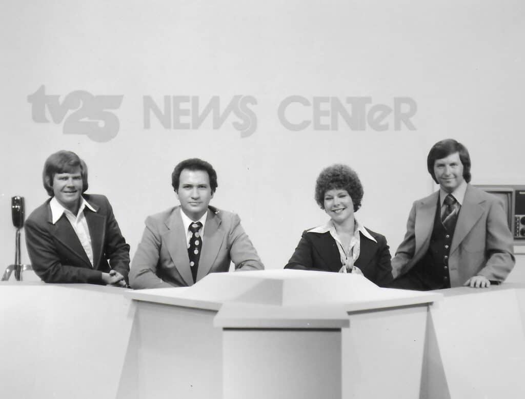 Mike Gilland, far right, working as a TV weatherman in 1977.