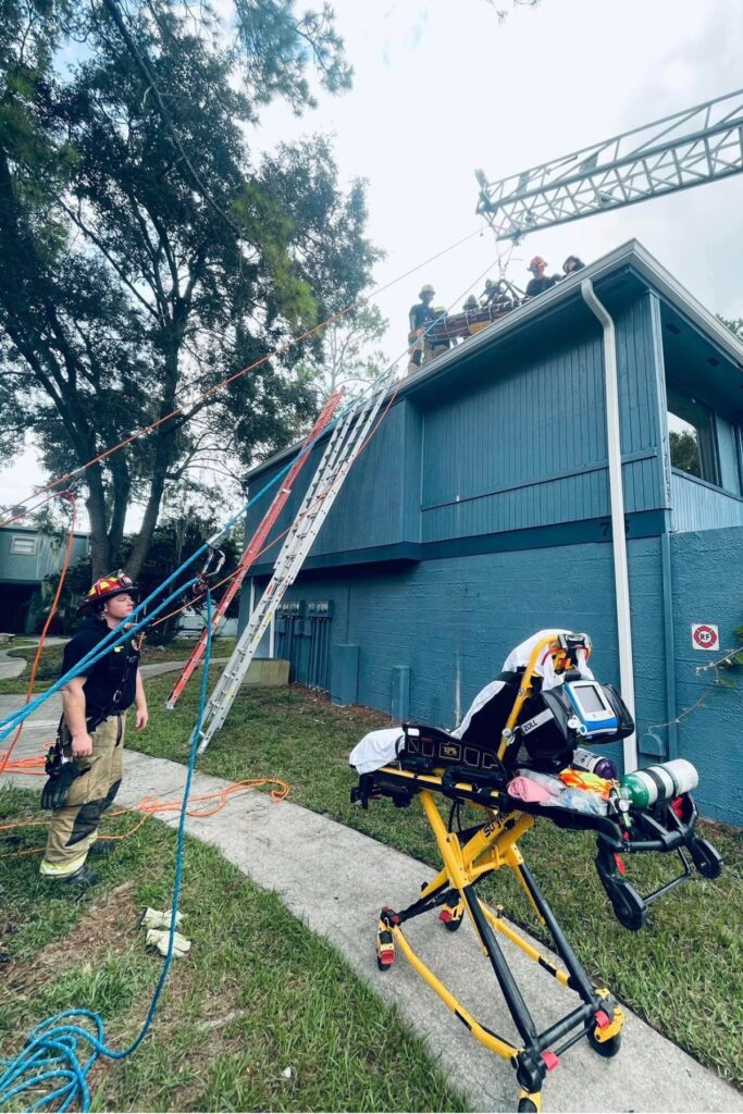 Alachua County Fire Rescue units lowered a man down from the rooftop Wednesday at Sparrow Apartments after he passed out.