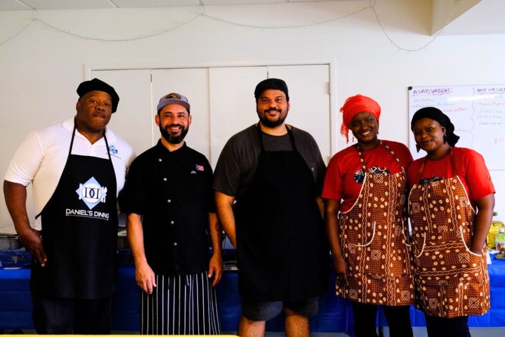 Daniel Mitchell of Daniel’s Dining Ivan Perez of Taino Roots, Robert Colon of Working Food, Awa Saba and Aisse Kane line up after serving their specialties at a multicultural dining event last month.