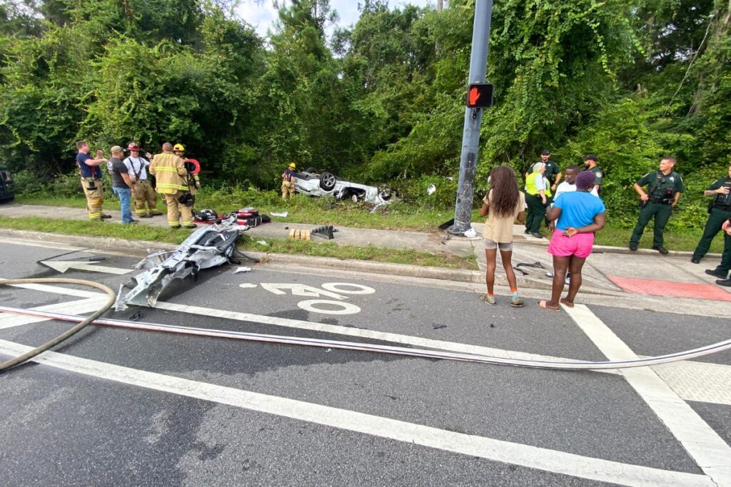 Emergency responders extricated a driver whose vehicle overturned after hitting a pole at the intersection of Hawthorne Road and SE 43rd Street on Sunday morning.