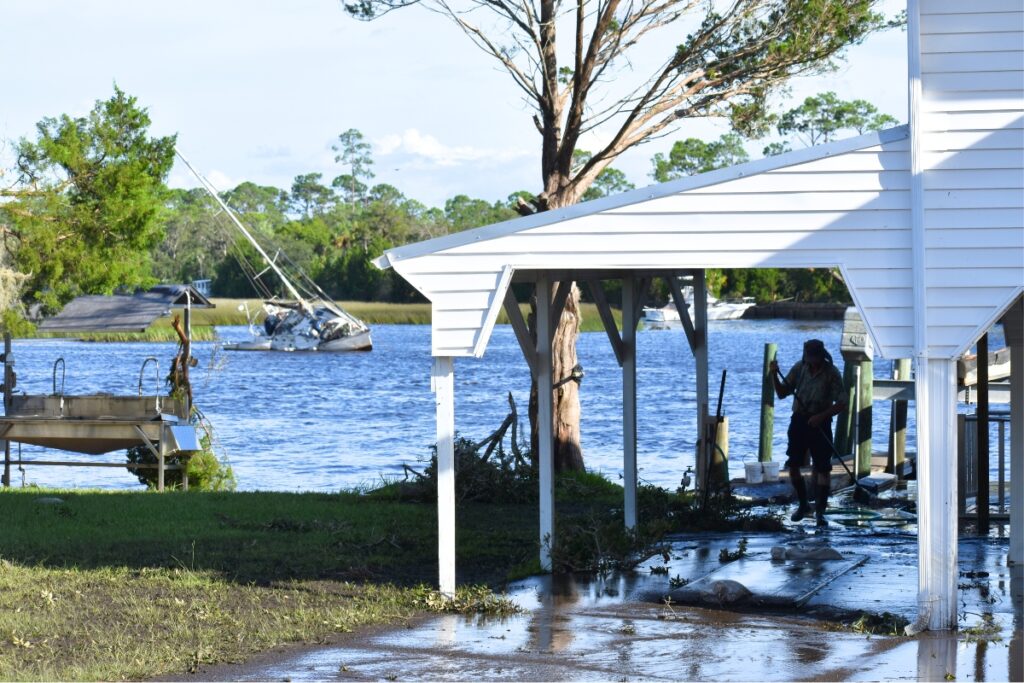 A man cleans up on Wednesday afternoon in Steinhatchee.