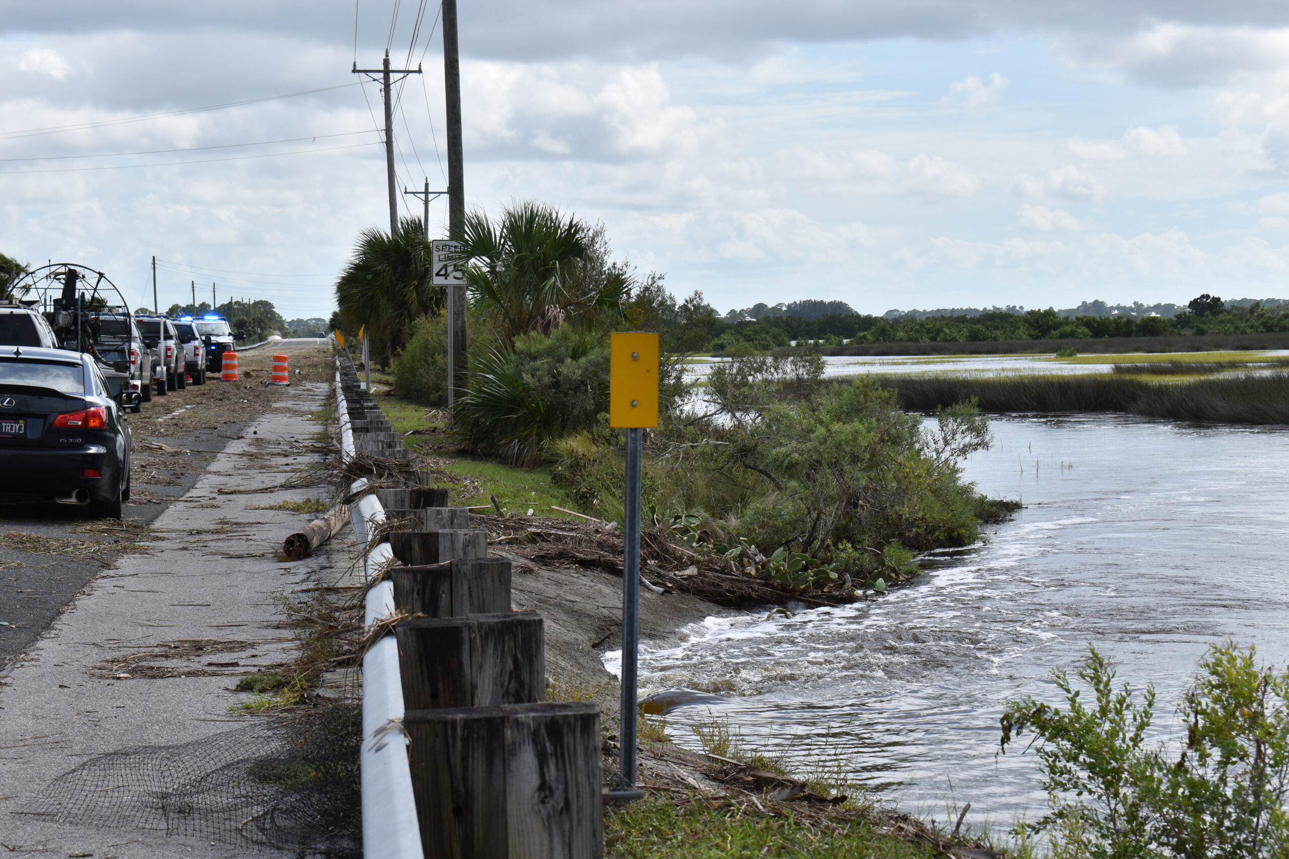 Authorities blocked off the bridge into Cedar Key as part of the re-entry plan_Cred Glory Authorities blocked off the bridge into Cedar Key as part of the re-entry plan.