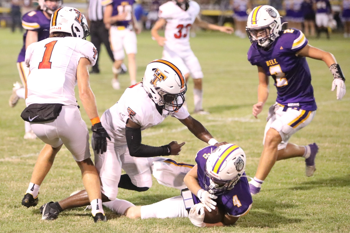 Bell's Cason Rose intercepts a second quarter Trenton pass in a 28-0 home loss to the Tigers on Thursday.