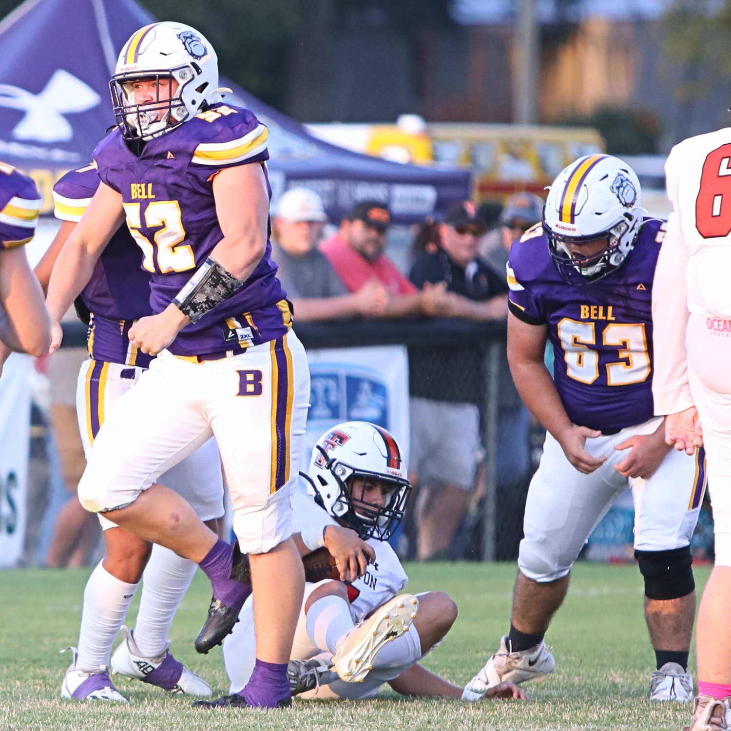 Bell's Lucas Stapp (52) celebrates after tackling Trenton quarterback Jackson Gentry at the 1-yard line in the first quarter on Thursday.