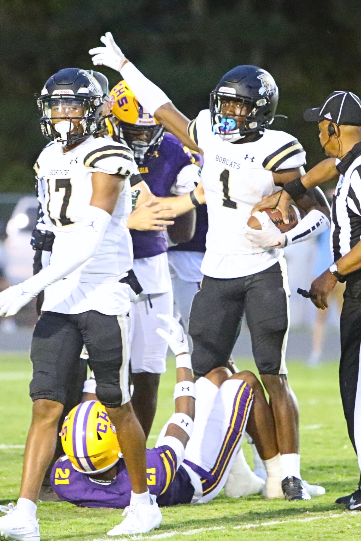 Buchholz's Jordan Richardson catches a first quarter pass for a first down on Friday.