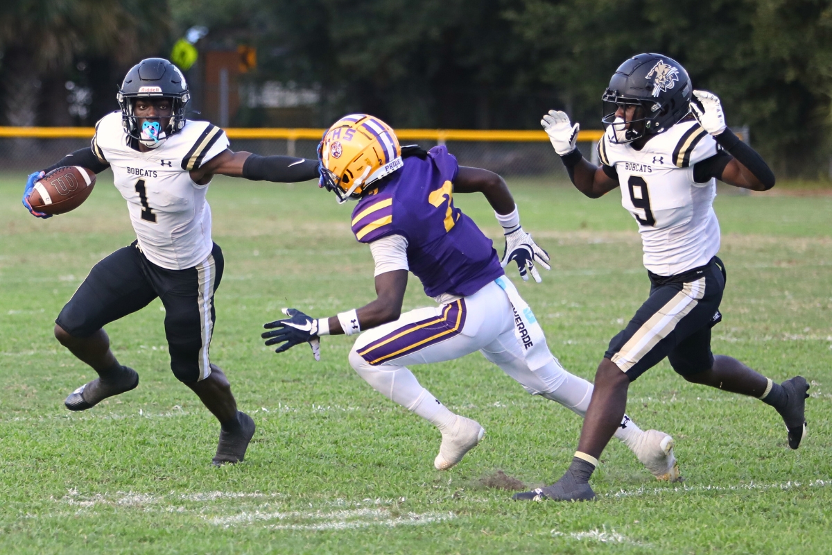 Buchholz's Jordan Richardson takes a third quarter reception for a short gain in a 41-13 win over Columbia on Saturday.