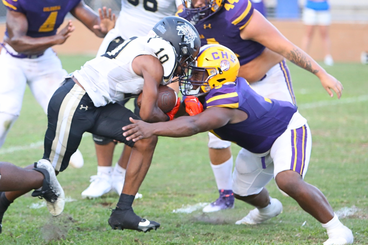 Columbia's Wilson Philemon (3) attempts to tackle Buchholz's Quinton Cutler in the second quarter on Saturday.