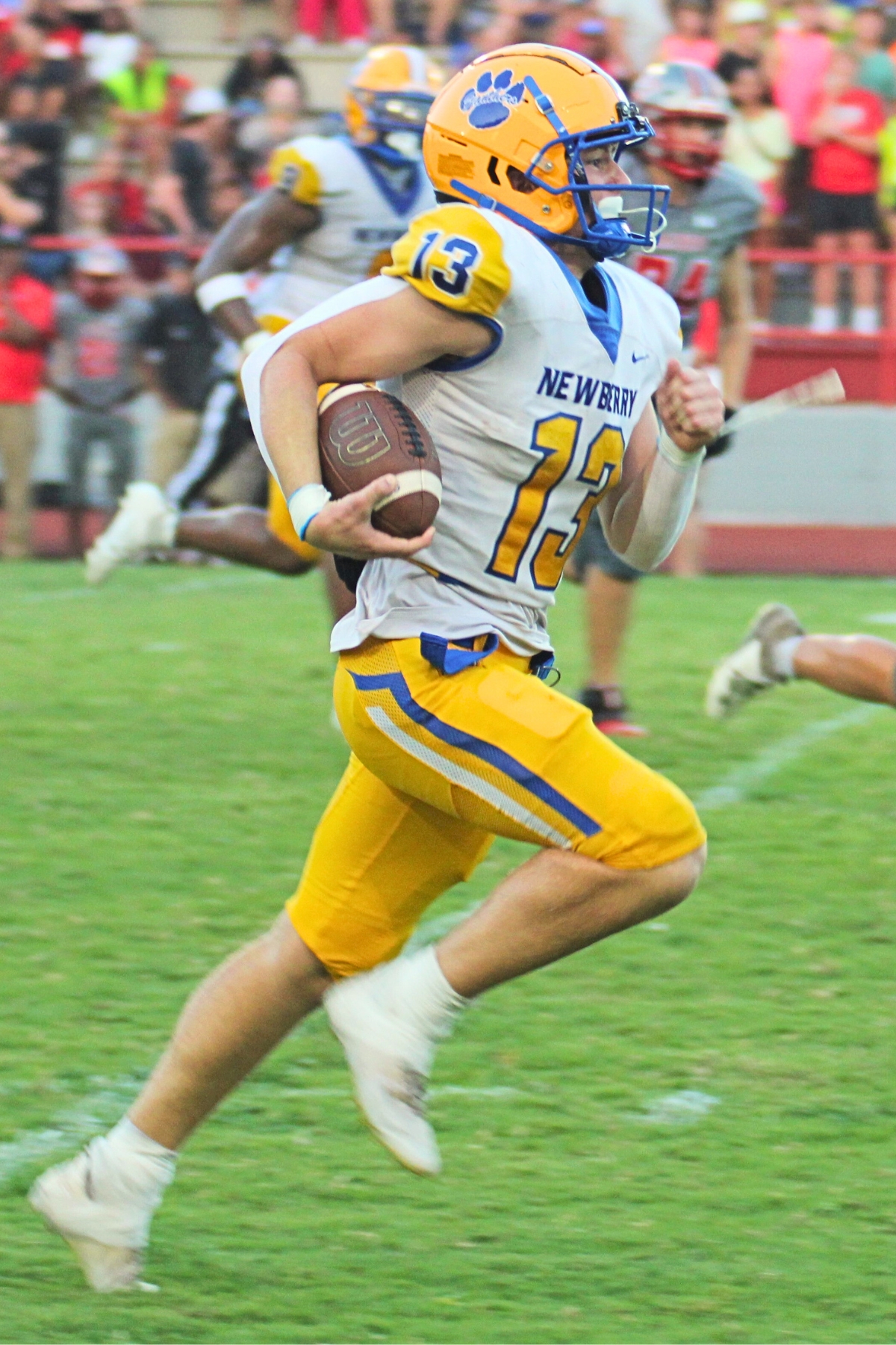 Newberry's Wyatt Hester returns an interception for a touchdown in a 68-10 road win over Santa Fe on Friday.