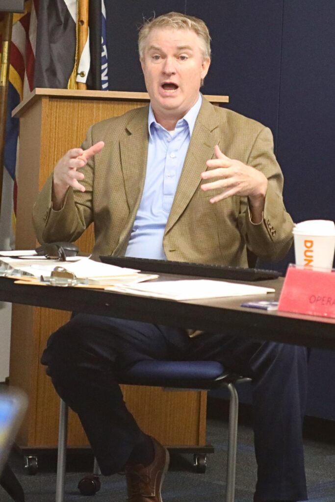 SF College Associate VP for Information Technology Bill Penney talks to the SF Emergency Management Team at Tuesday's tabletop safety training exercise.
