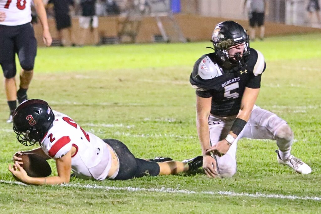 Buchholz's Matthew Kade with a second quarter sack against Creekside on Friday.