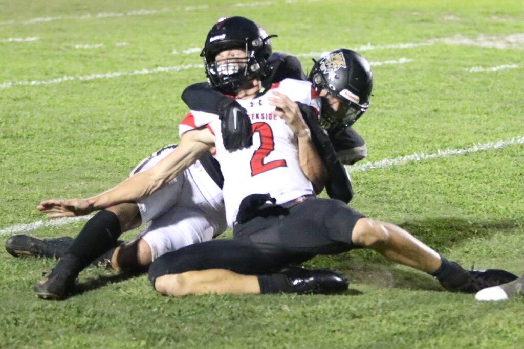 Buchholz's Nick Clayton pressured Creekside's quarterback into a first quarter incomplete pass on Friday.