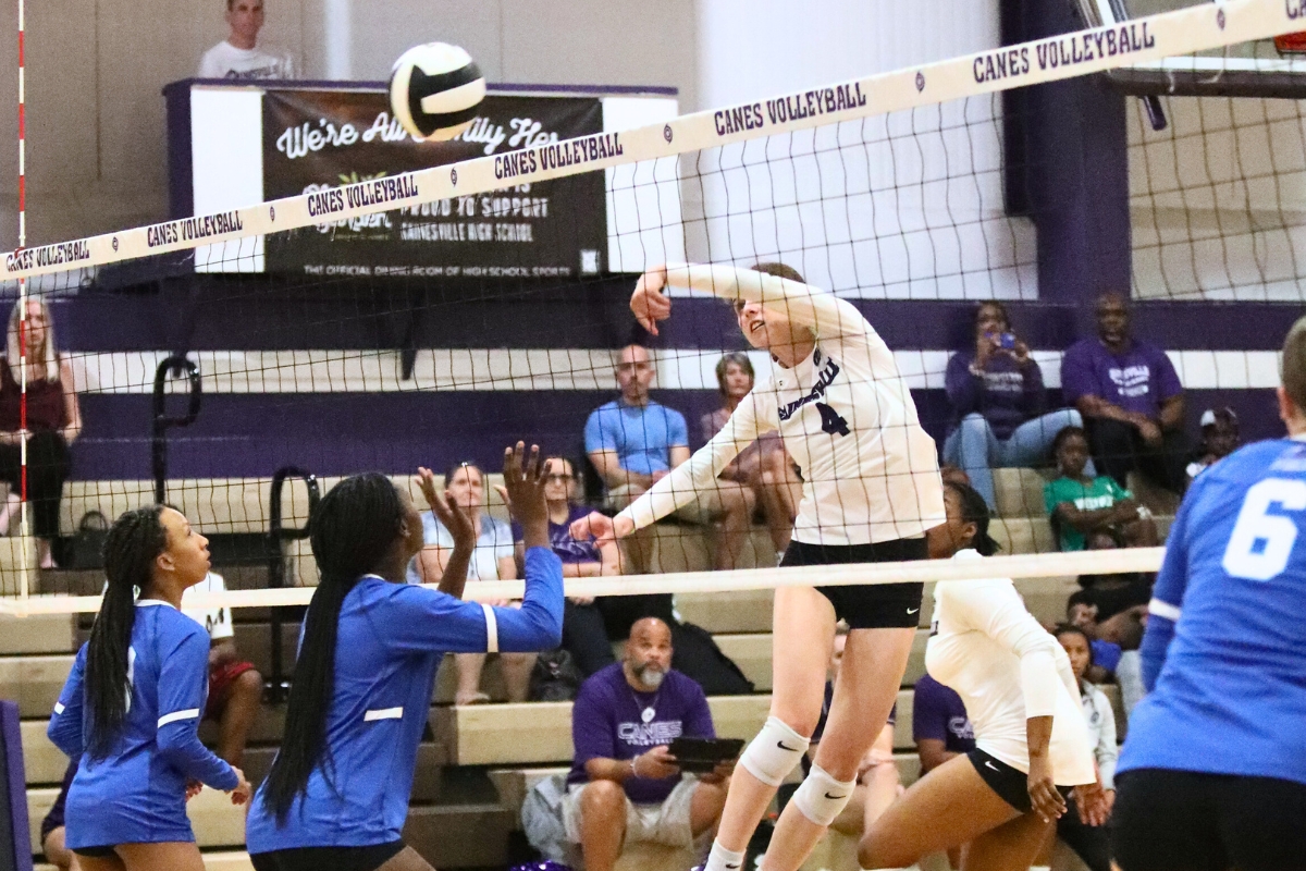 Gainesville's Chloe Petrik with a kill against P.K. Yonge on Monday.