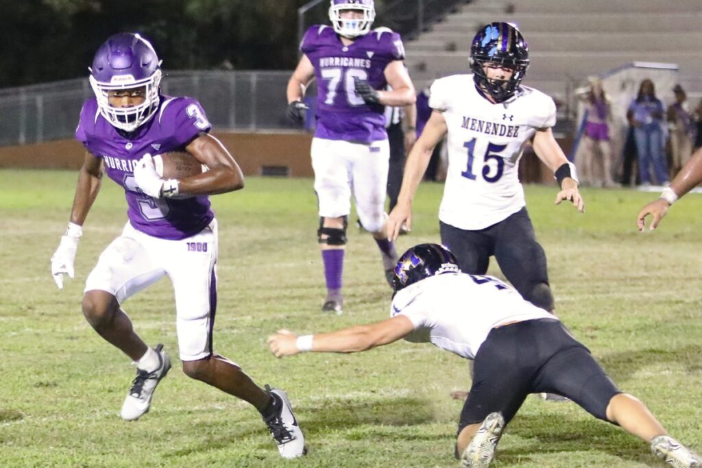 Gainesville's Dacarion Debose (3) with second quarter run against Menendez on Friday.
