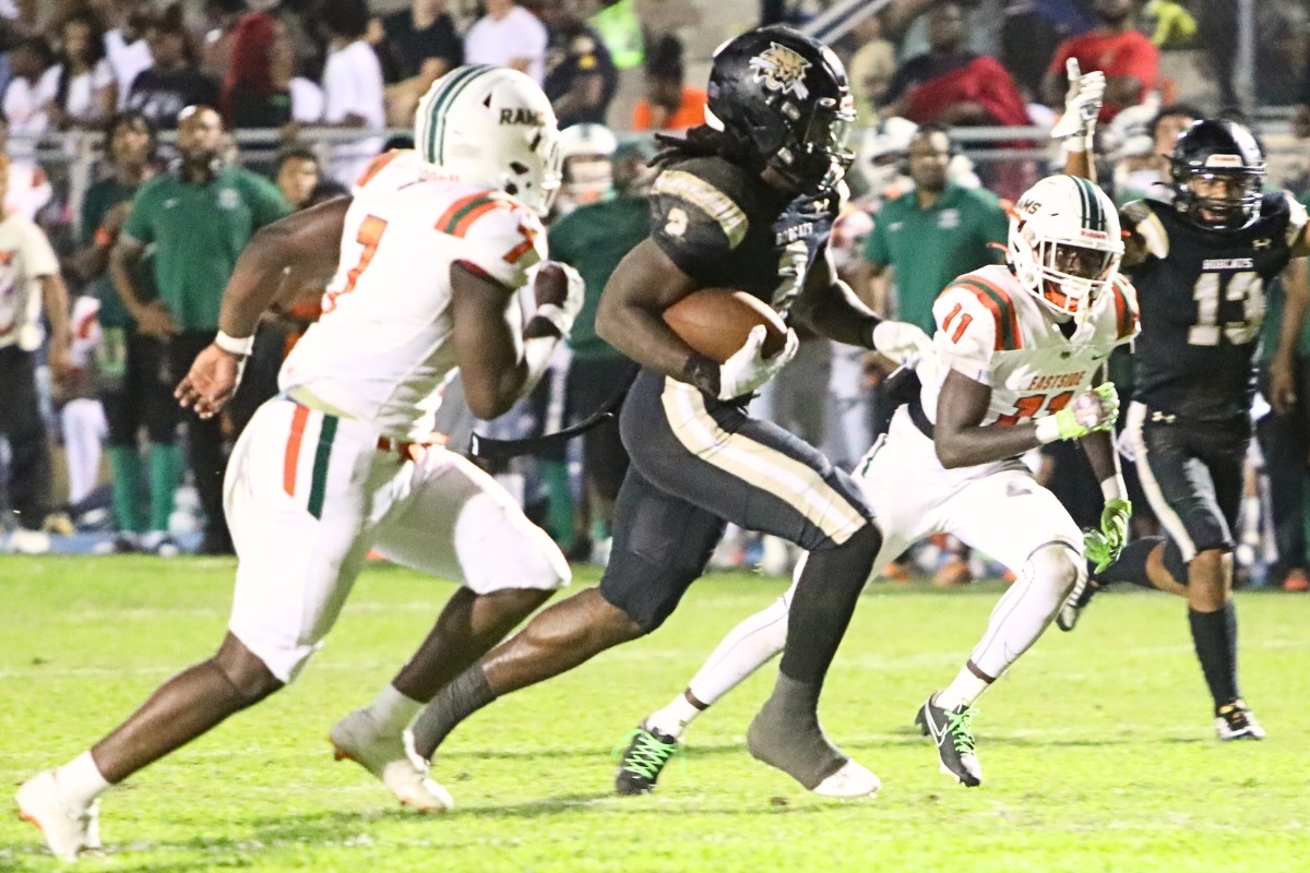 Myles Graham on his way to a second quarter touchdown against Eastside on Friday.
