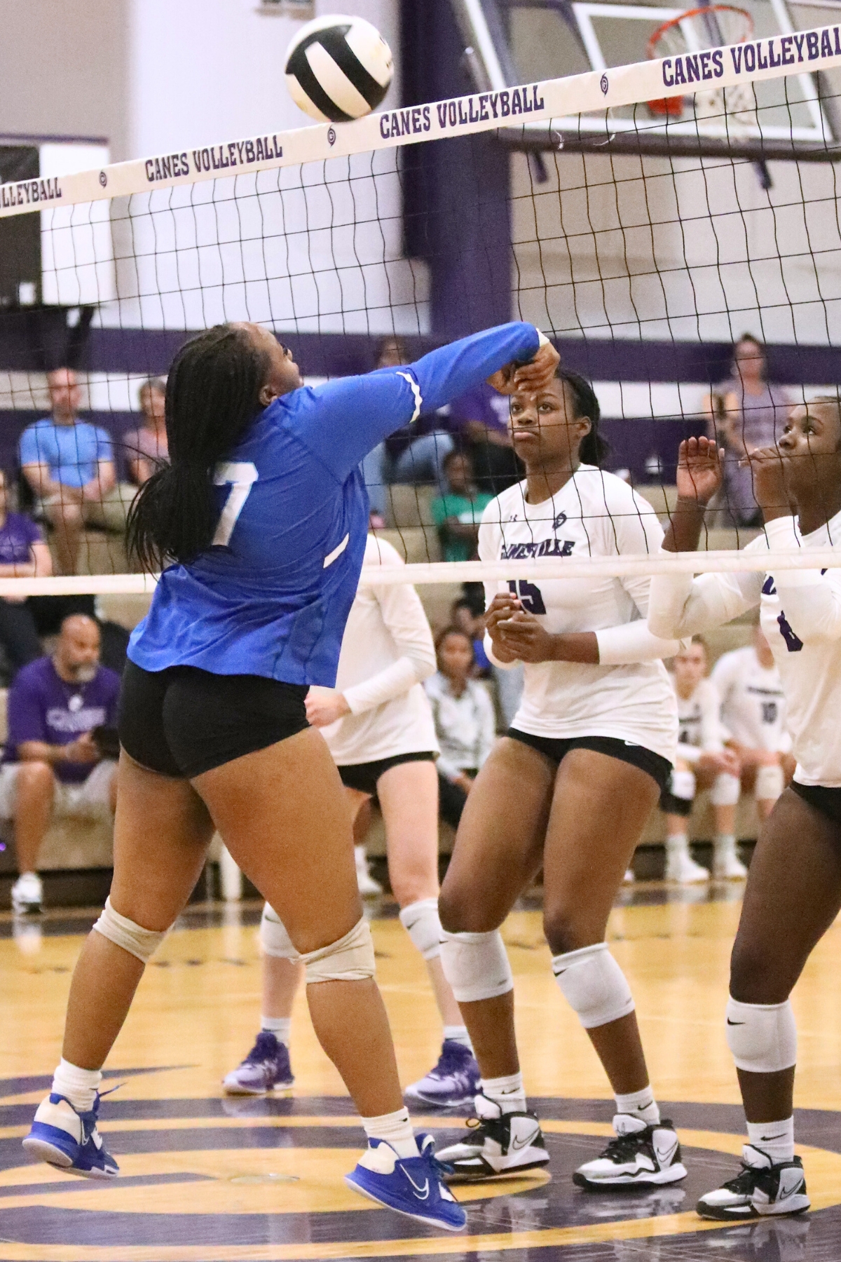 P.K. Yonge's Trinity Jacobs with a dig at the net against Gainesville on Monday.
