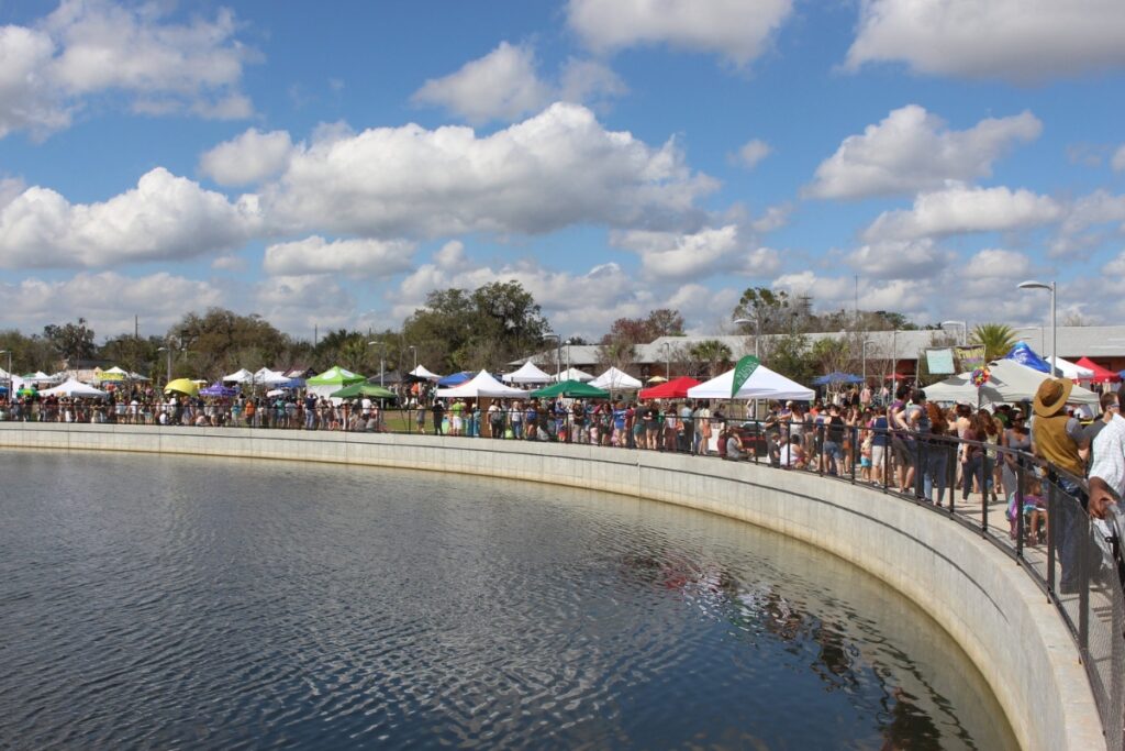 People along the waterfront at Depot Park in Gainesville.