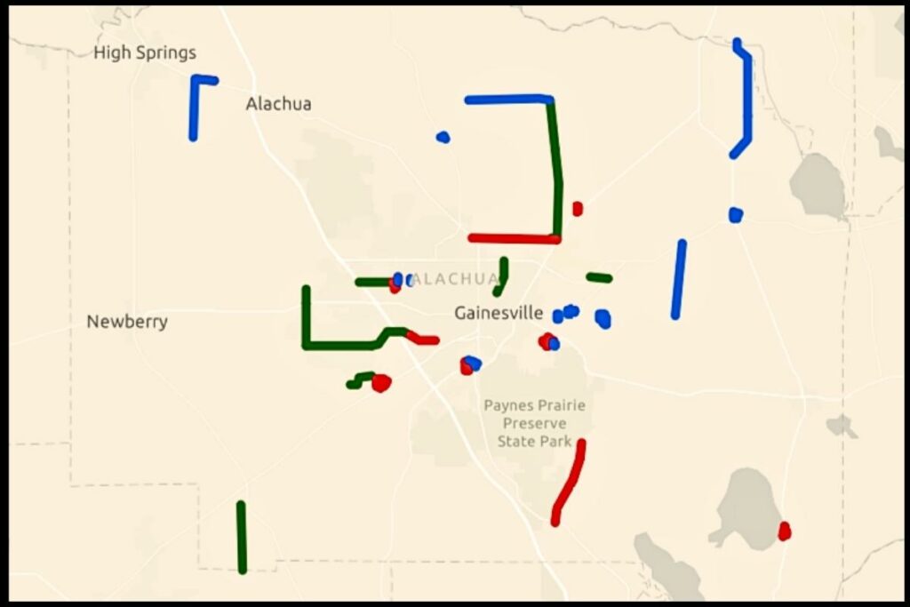 A map of Alachua County shows road segments set for construction in 2023 (dark green), 2024 (red) and 2025 (blue).