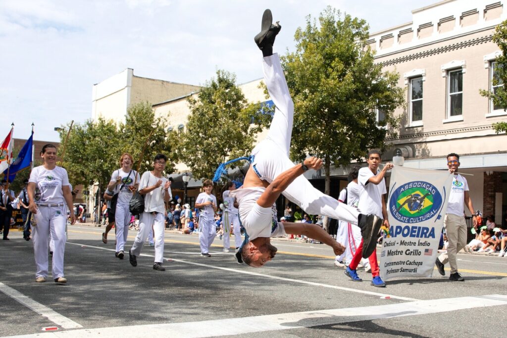 A member of the Associacao Resgate Cultural group at the UF Homecoming Parade on Friday.