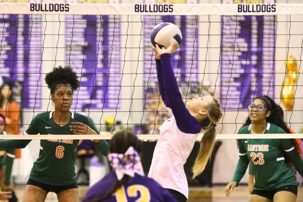 Bell's Rylee Johnson with a set against Eastside on Tuesday.