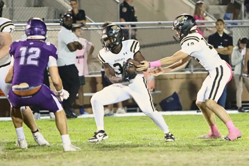 Buchholz's Asaph Bryant takes a second quarter handoff against Gainesville on Thursday.