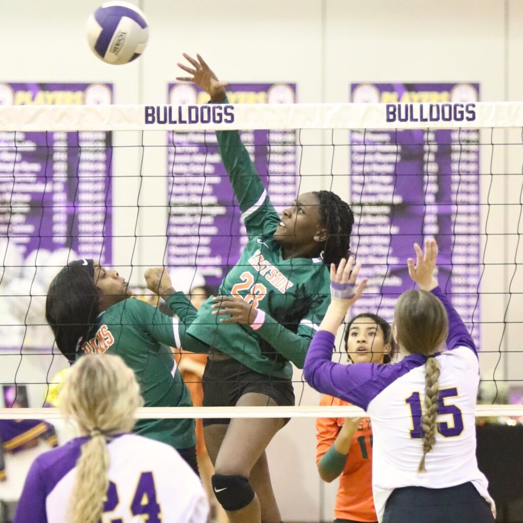 Eastside's Anijah Goss with a hit against Bell on Tuesday.