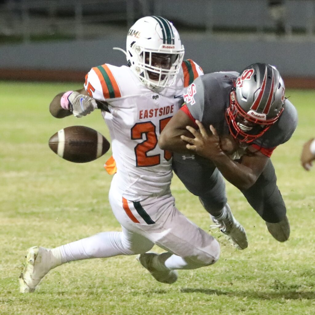 Eastside's Kamariyon Mack strips the ball from Santa Fe's Jamontre Markham and the Rams returned the ball for a touchdown on Friday.