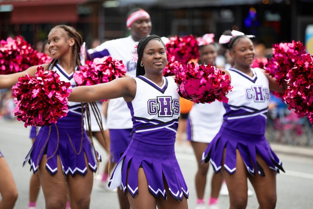 Gainesville High School cheerleaders in the UF Homecoming Parade on Friday.