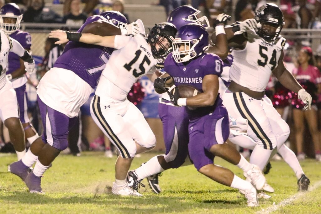 Gainesville's David Wilbon with a run against Buchholz on Thursday.