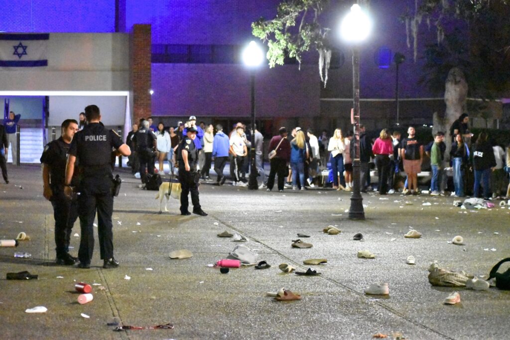 In the rush to escape, people dropped shoes, phones, backpacks and other belongings.