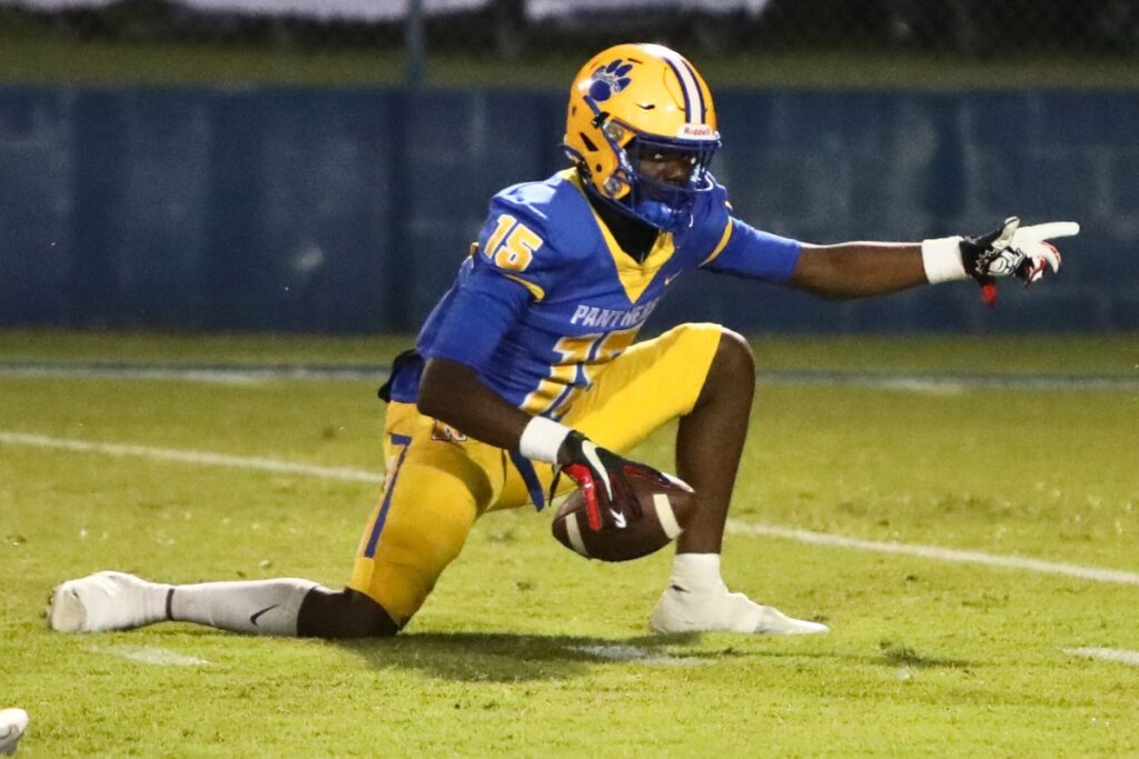 Newberry's Jayden Holcombe with a first quarter reception for a first down against P.K. Yonge on Friday.