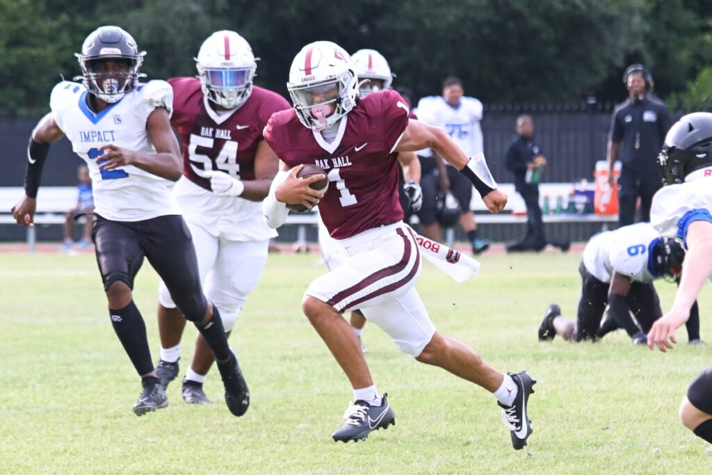 Oak Hall's Dakota Brower (1) had two rushing TDs and two passing TDs in a 74-32 win over Eagle's View (Jacksonville) on Sept. 29.