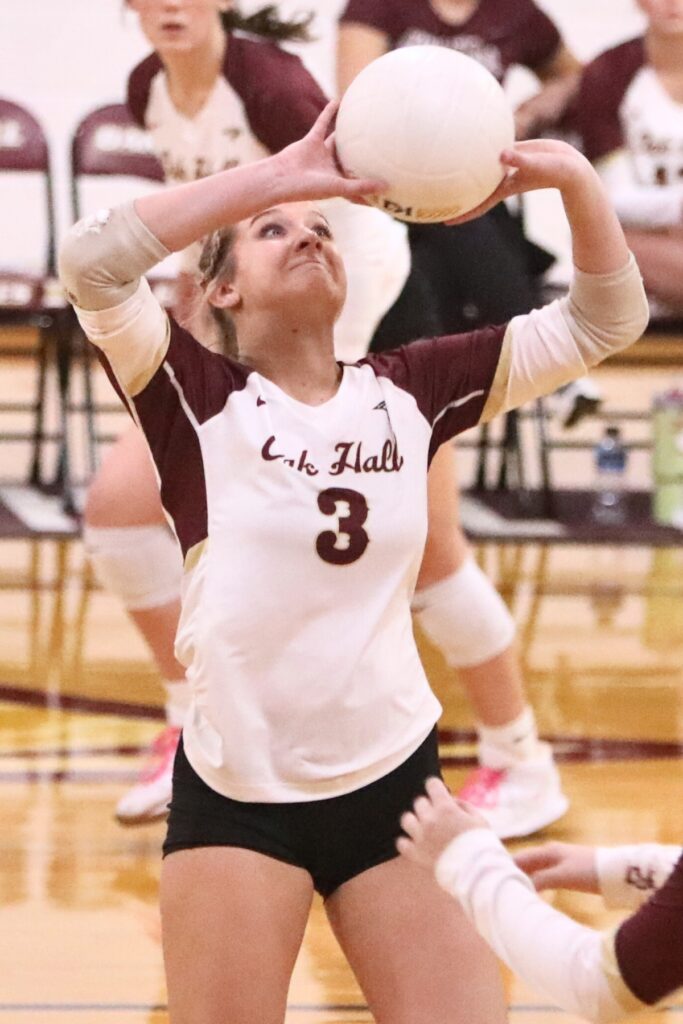 Oak Hall's Sophie Thompson with a set against North Florida Christian on Tuesday.