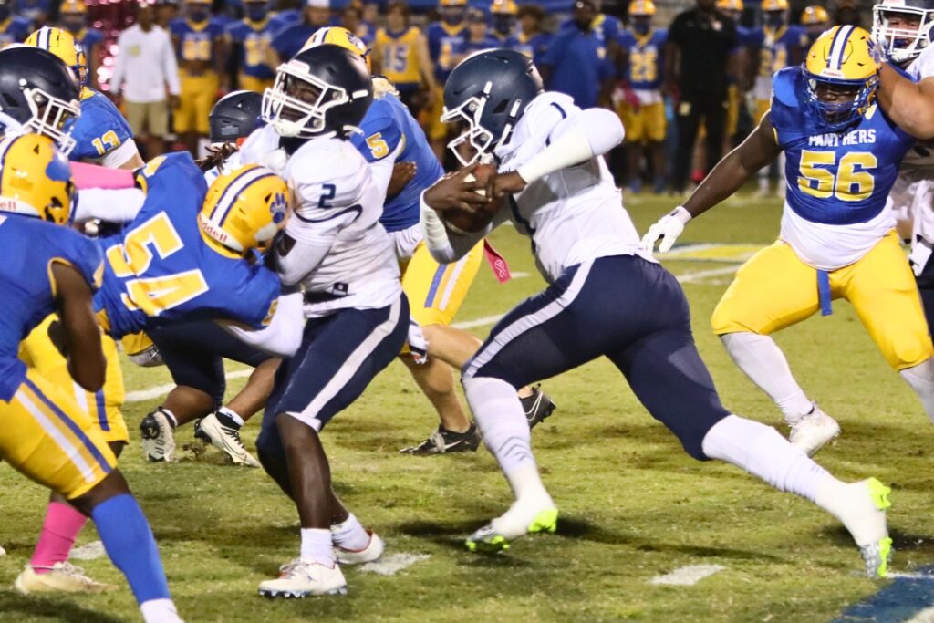 P.K. Yonge's Lawrence Wright with a quarterback keeper against Newberry on Friday.