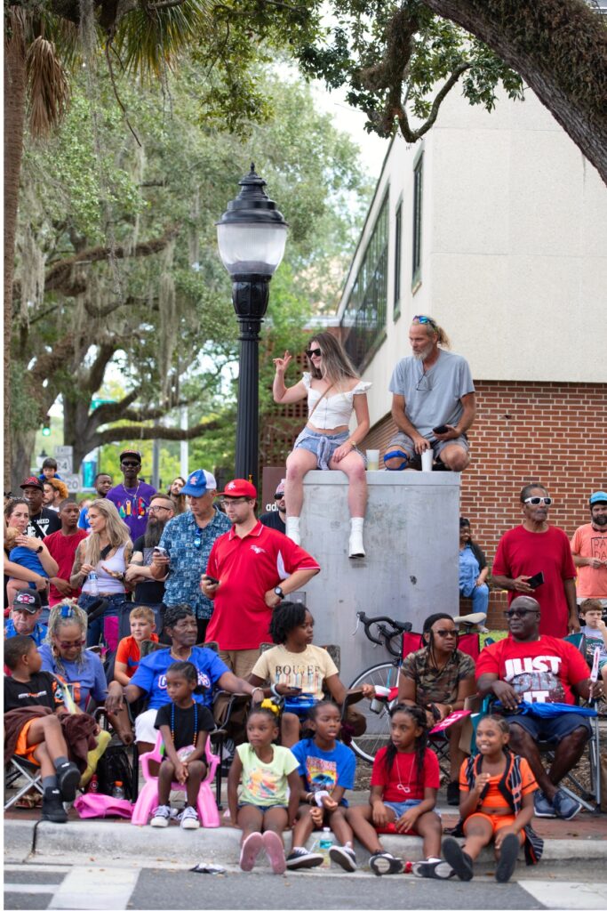 Spectators at the UF Homecoming Parade on Friday.