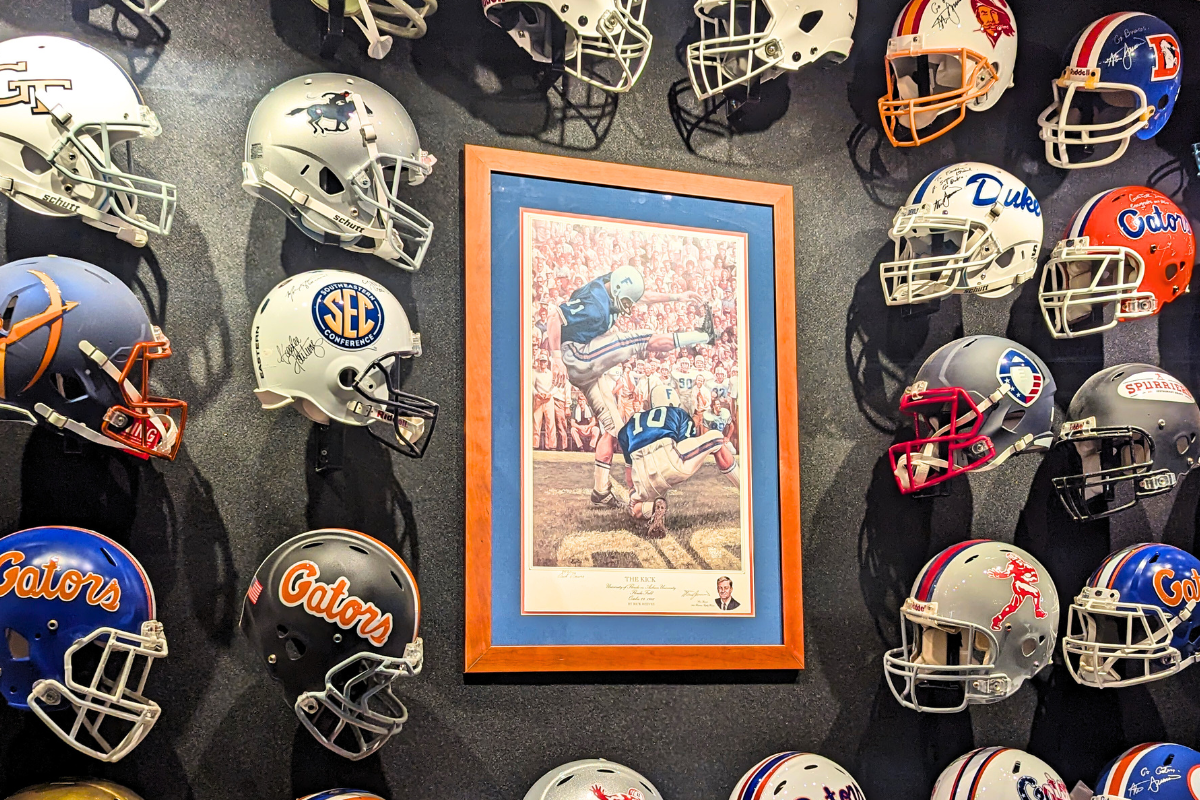 Spurrier's Gridiron Grillle wall featuring all of the teams Steve Spurrier played and coached for