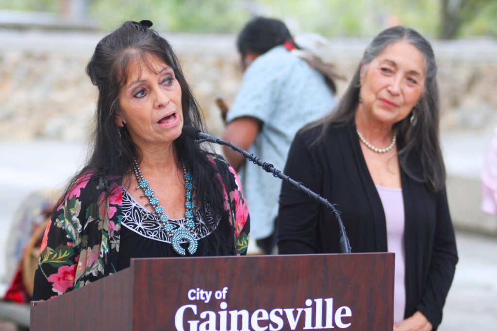 Sylvia Paluzzi speaks at the city of Gainesville's celebration for Indigenous Peoples' Day.